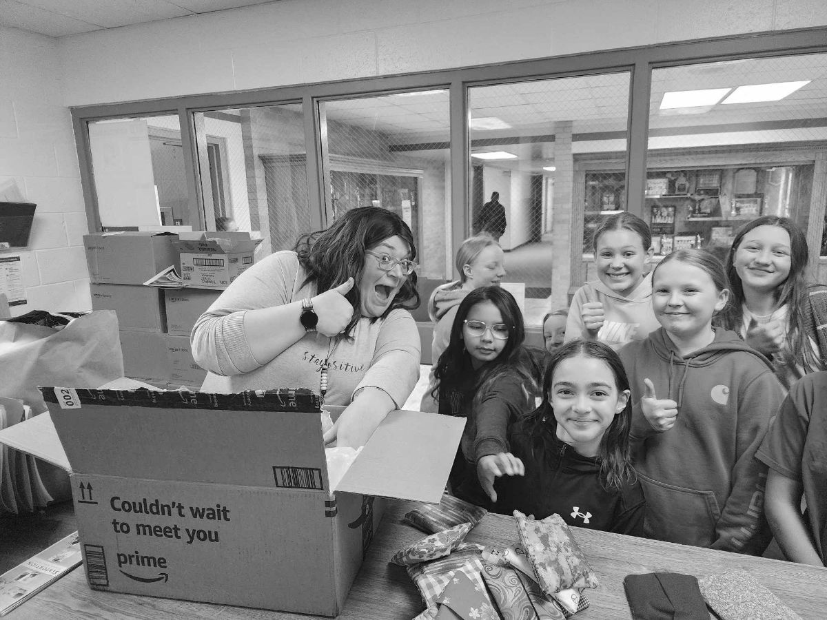 Desiree with some of her Baraga Area students, unpacking their moon time bags.